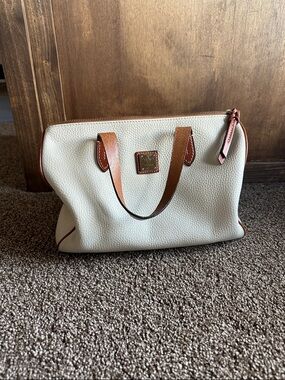 Dooney & Bourke Cream Leather Satchel with Brown Trim and Handles